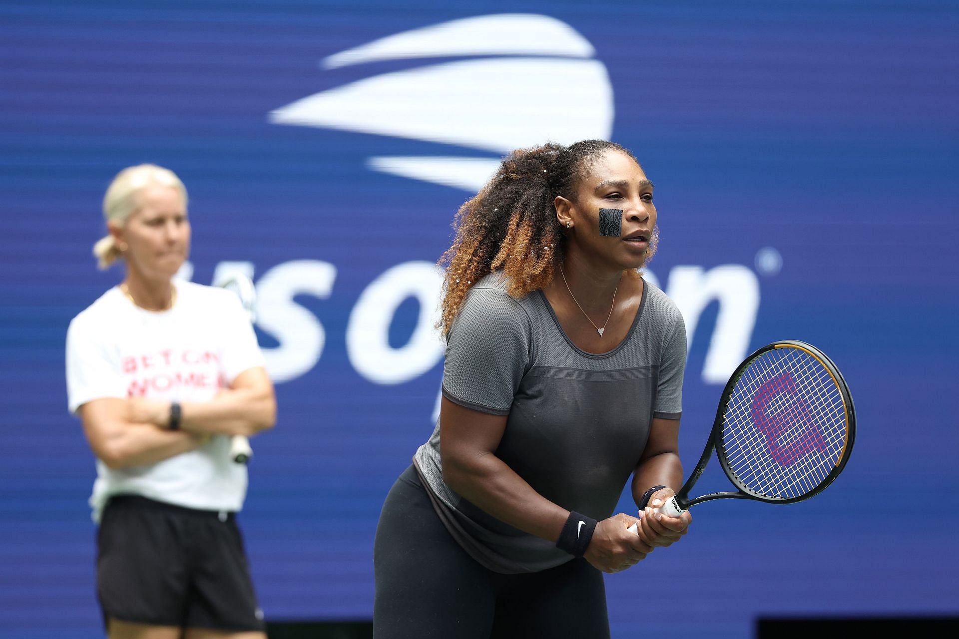 Serena Williams with Rennae Stubbs( in background) at the 2022 US Open