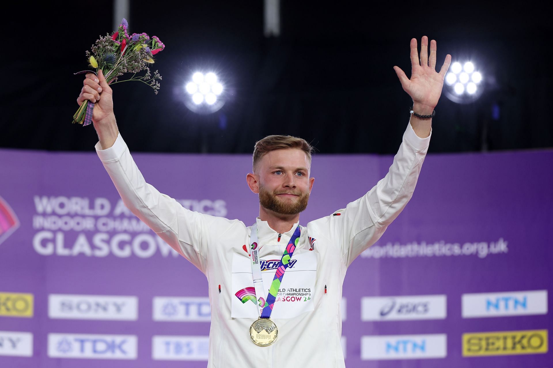 Josh Kerr of Team Great Britain reacts during the medal ceremony for the Men&#039;s 3000 Metres Final at the World Athletics Indoor Championships 2024 in Glasgow.