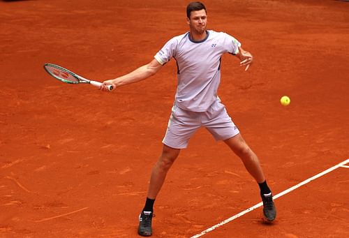 Hurkacz hitting a forehand