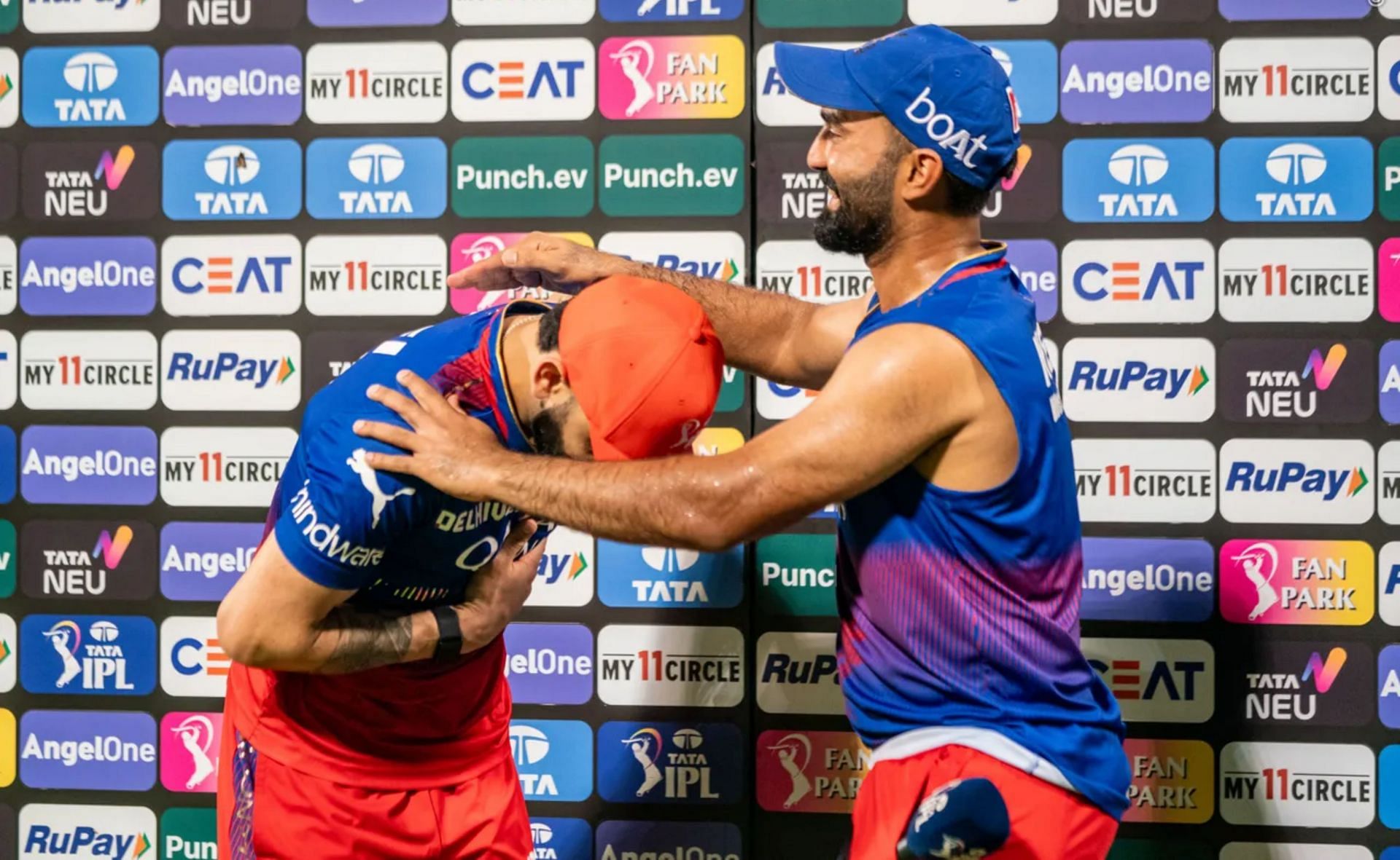 Dinesh Karthik and Virat Kohli after the match on Saturday. (P/C: BCCI)