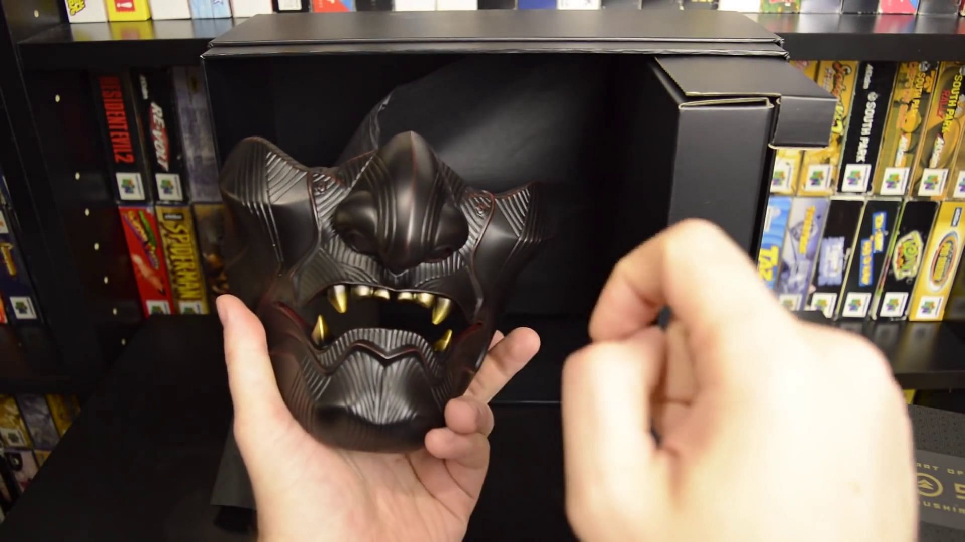 The Sakai Mask comes with a stand for showcasing (Image via YouTube/finngamer)