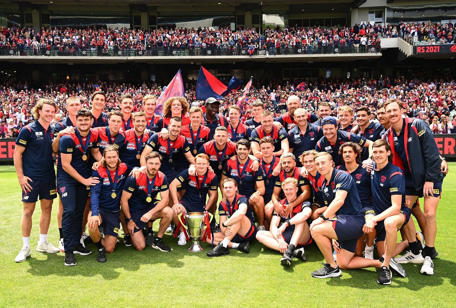 The Demons pose with the trophy during the Melbourne Demons AFL Premiership Celebration