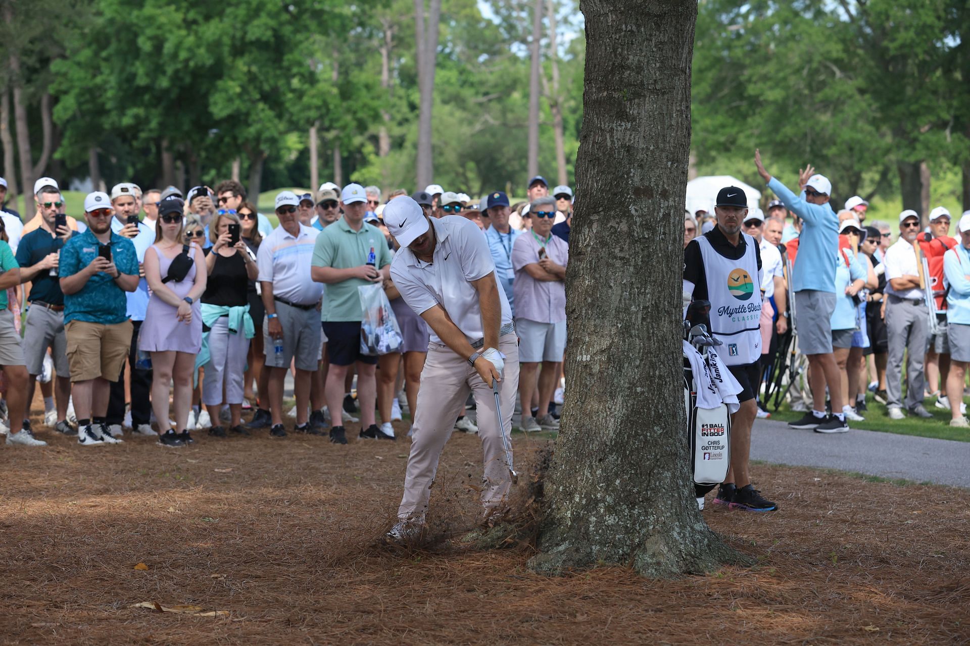 Chris Gotterup playing in rough at Myrtle Beach Classic (Image via Getty)