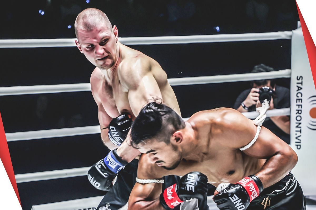 Dmitry Menshikov (left) sends Sinsamut crashing to the canvas in Bangkok, Thailand.