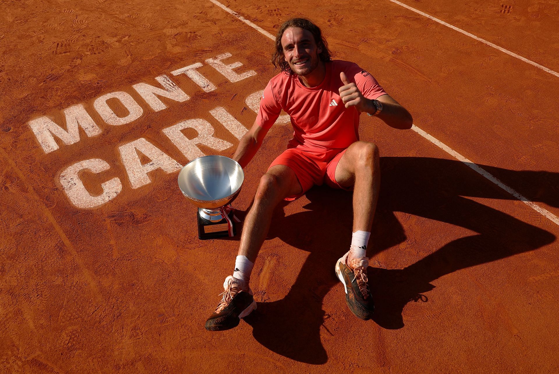 Stefanos Tsitsipas poses with the Monte-Carlo Masters trophy