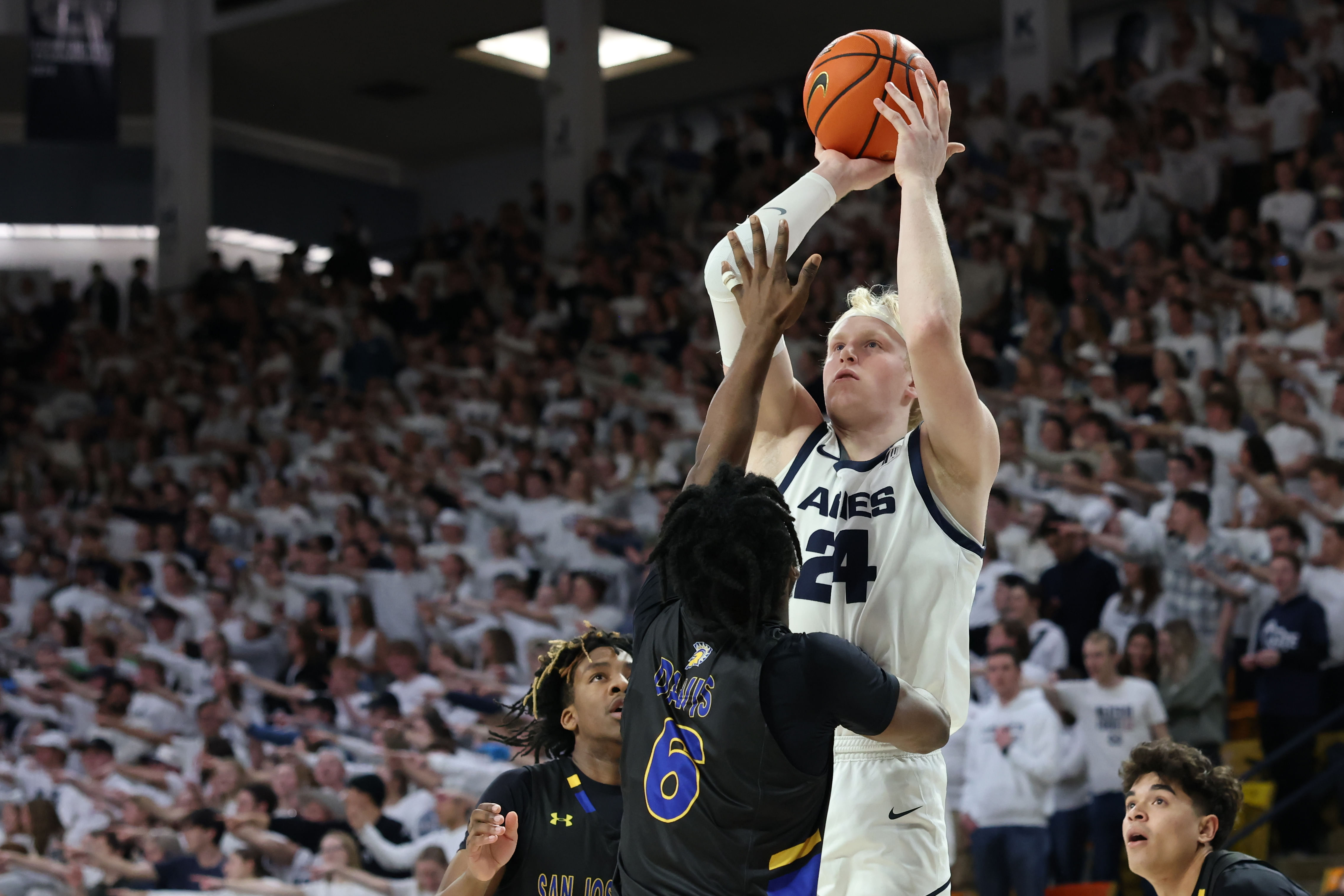 Karson Templin played for 23 games last season and averaged 2.5 ppg for Utah State,
