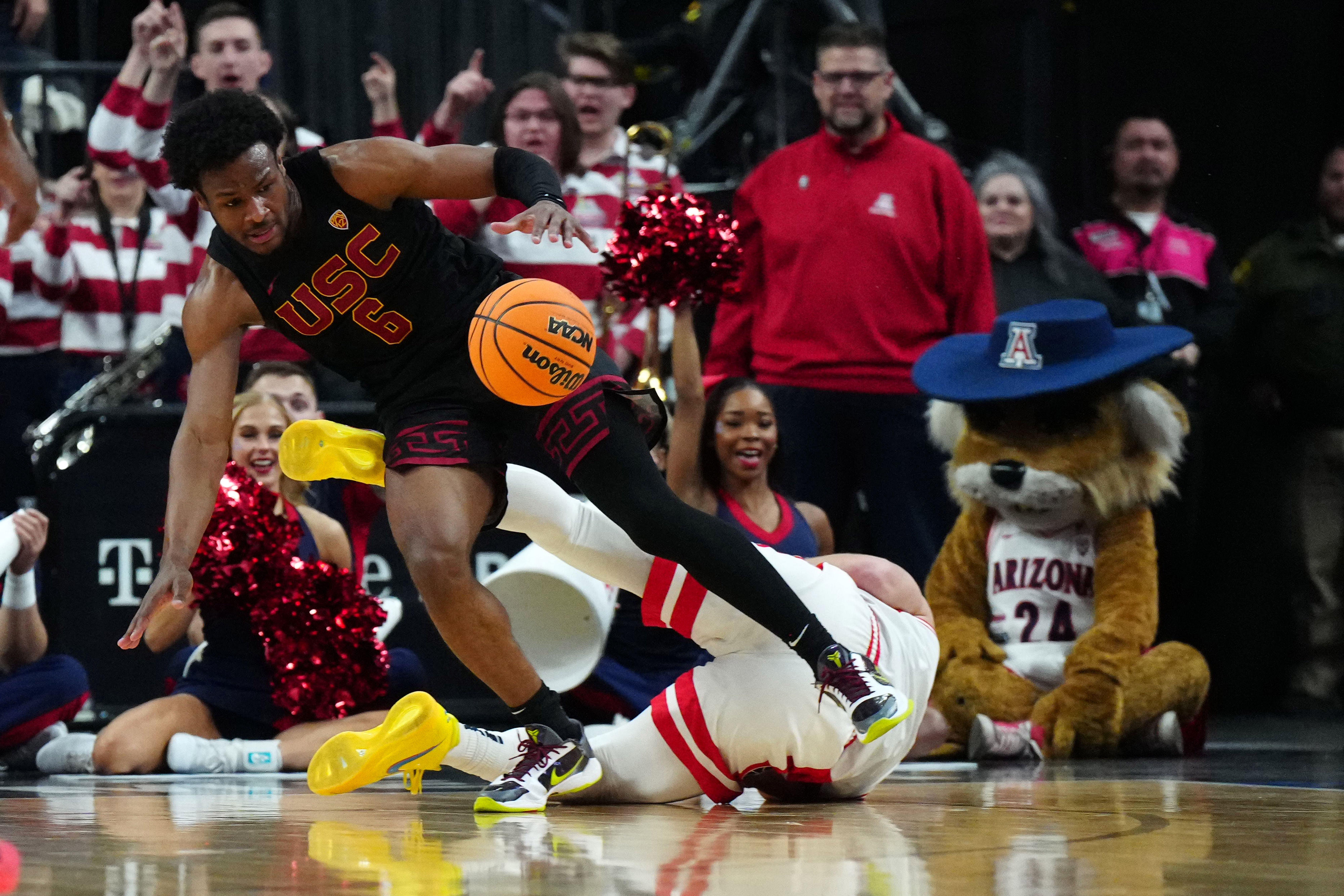 Bronny James hustles for the loose ball in a Pac-12 Tournament game.