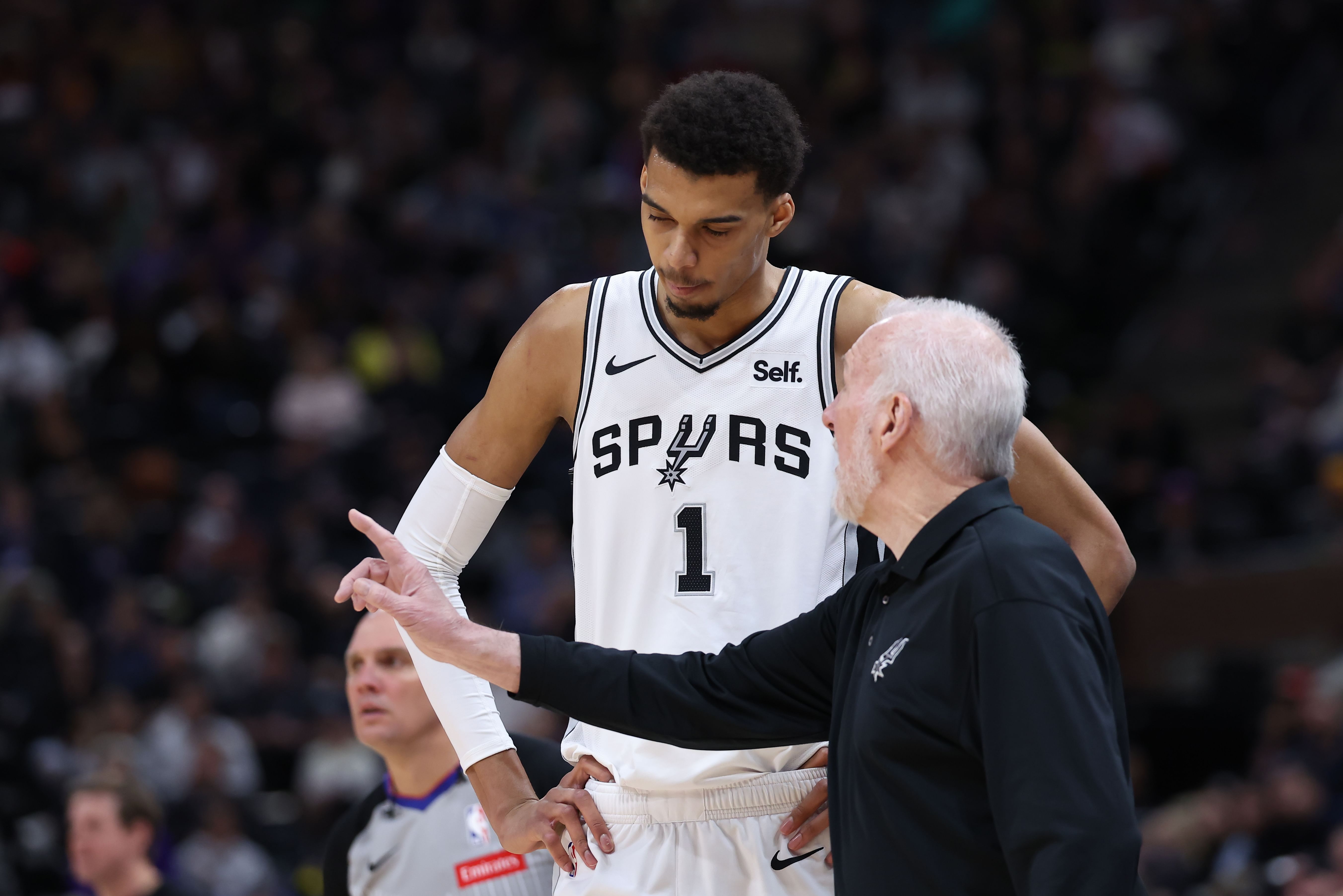 San Antonio Spurs center Victor Wembanyama and coach Greg Popovich