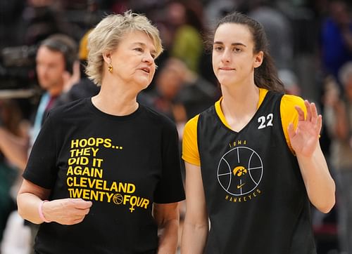 Iowa coach Lisa Bluder (left) talks to Caitlin Clark (right) in one of the team's practices.