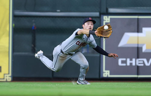 Steven Kwan made a diving catch and threw to second base, completing the game-ending double play.