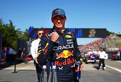 Max Verstappen receives aid from Nico Hulkenberg before clinching the pole position in Imola