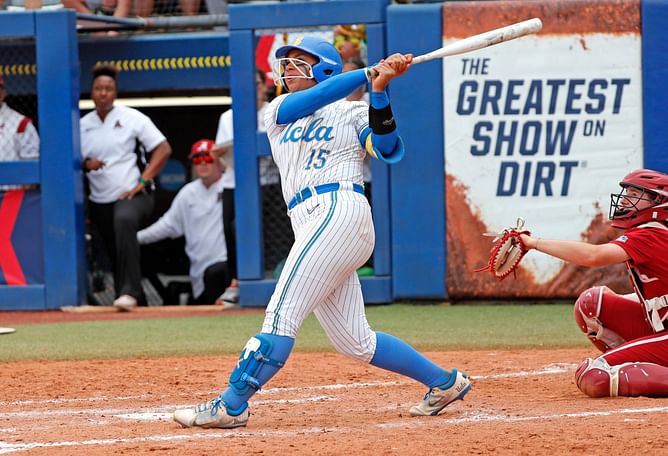 WATCH: UCLA infielder Jordan Woolery's impressive home run ball gets gifted to her mom during WCWS opening game