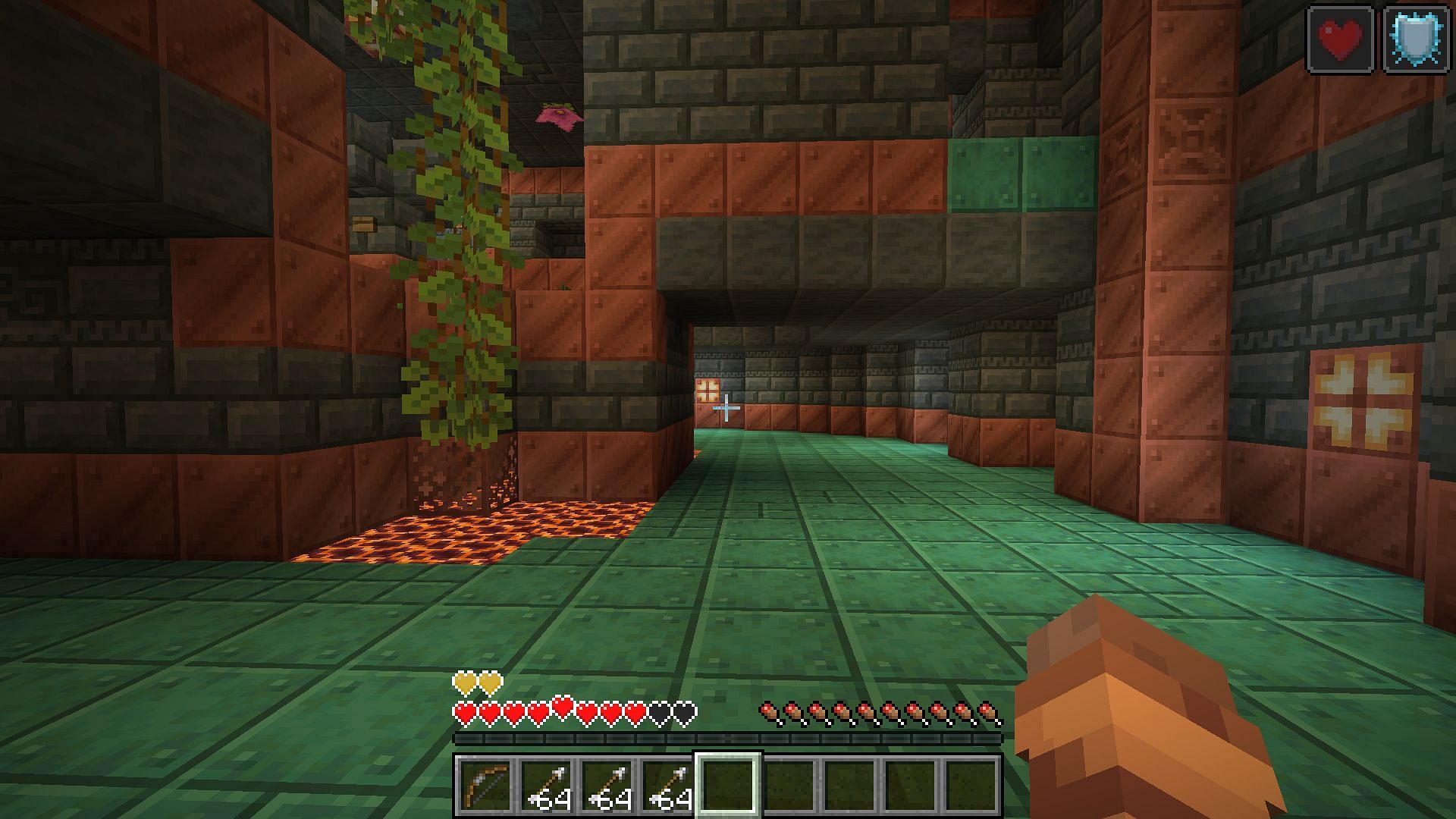Golden apples have several useful effects for staying alive in trial chambers (Image via Mojang)