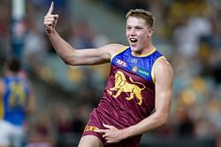 Inside Logan Morris' whirlwind Brisbane Lions debut: A massive pre-match McDonald's meal, smaller shoes and more