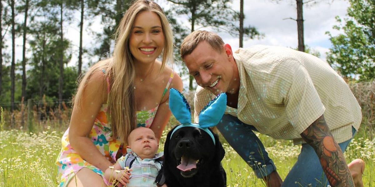 Caeleb and Meghan Dressel with their son August and dog