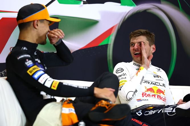 Watch: Lando Norris playfully kicked by Max Verstappen in the middle of an interview