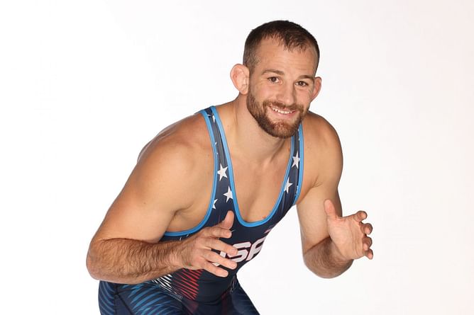 WATCH: David Taylor describes his experience in Oklahoma State Wrestling room as 8 year old during first press conference as team's head coach