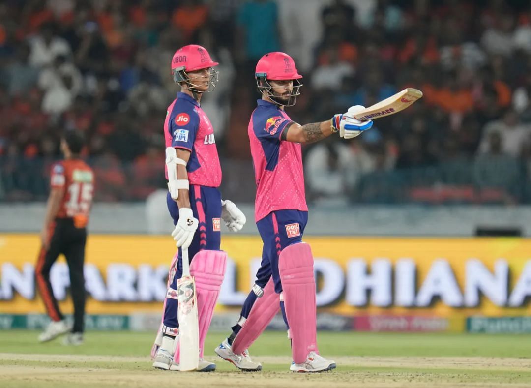 Riyan Parag acknowledging his fifty while Yashasvi Jaiswal standing beside him