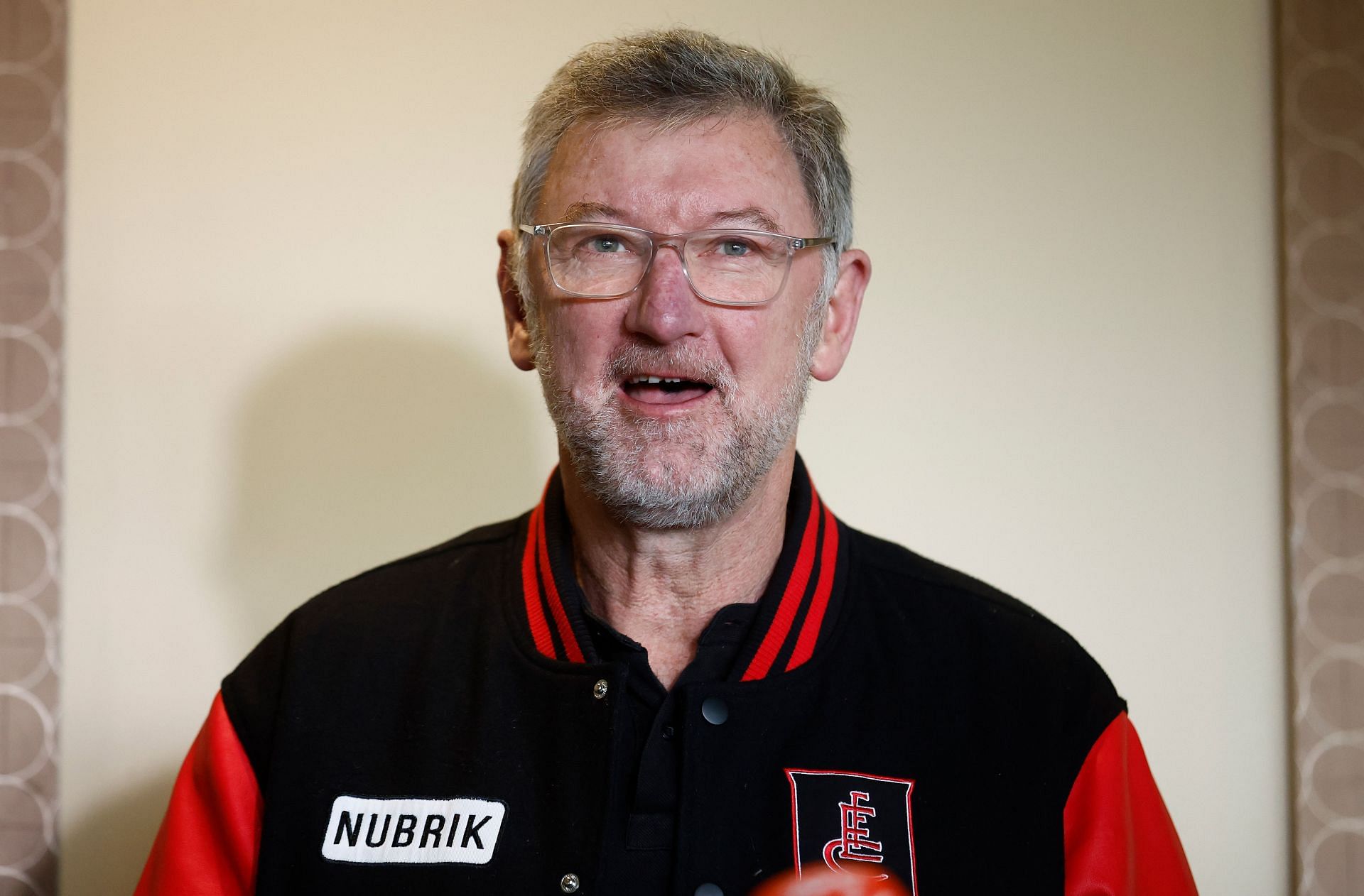 Simon Madden speaks with media during the Essendon and Carlton AFLW Media Opportunity at Windy Hill on October 26, 2023