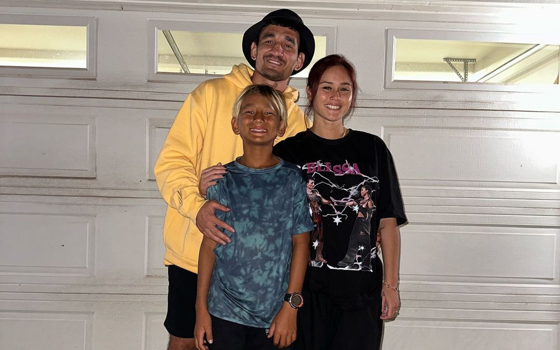 Max Holloway (left) shares son Rush