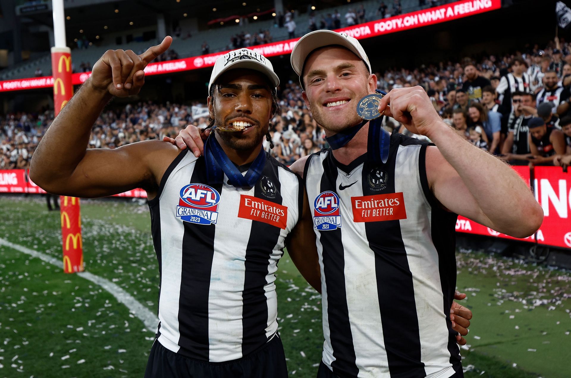 Isaac Quaynor of the Magpies and Tom Mitchell of the Magpies celebrates during the 2023 AFL Grand Final match between the Collingwood Magpies and the Brisbane Lions