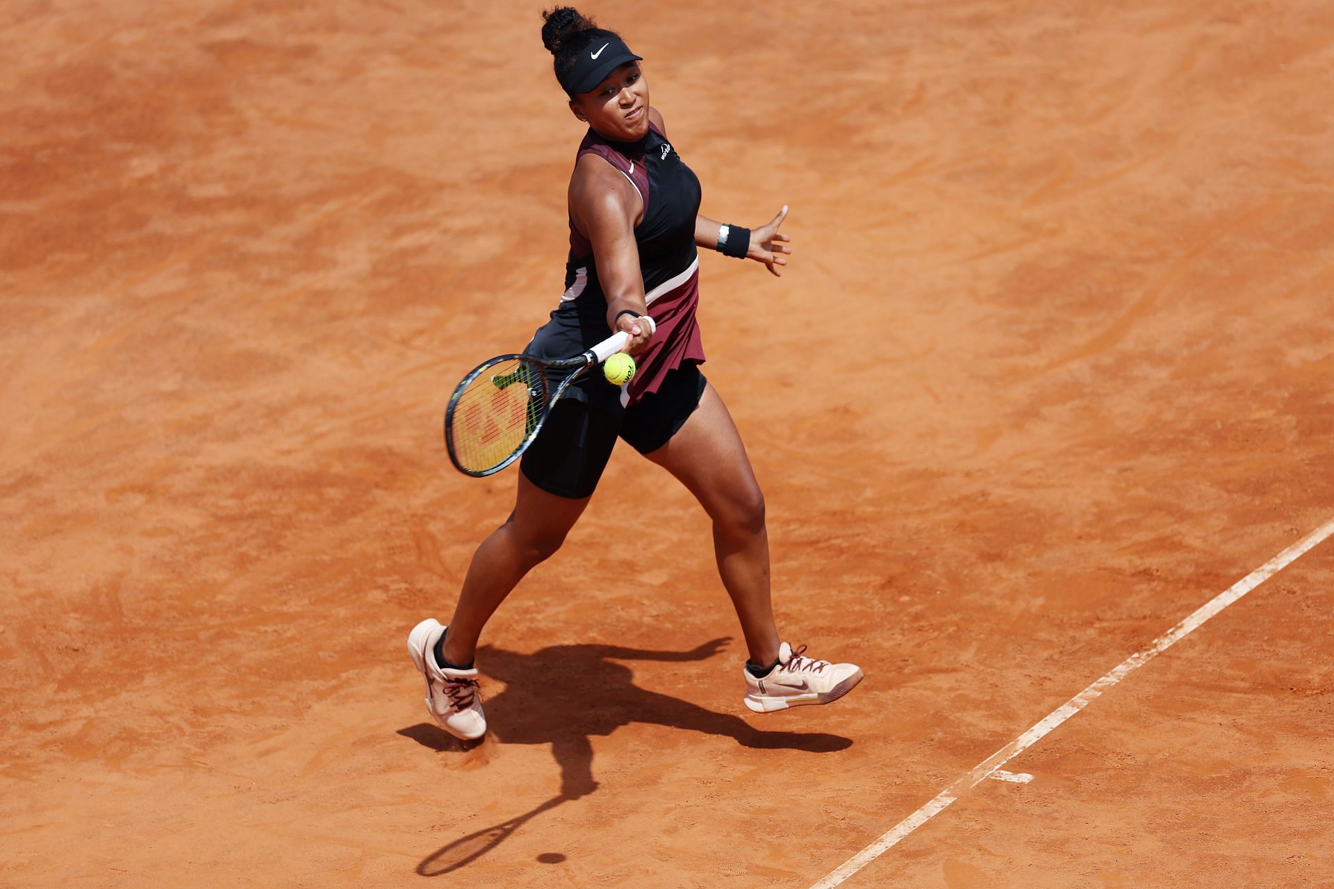 Naomi Osaka in action against Daria Kasatkina at the Italian Open