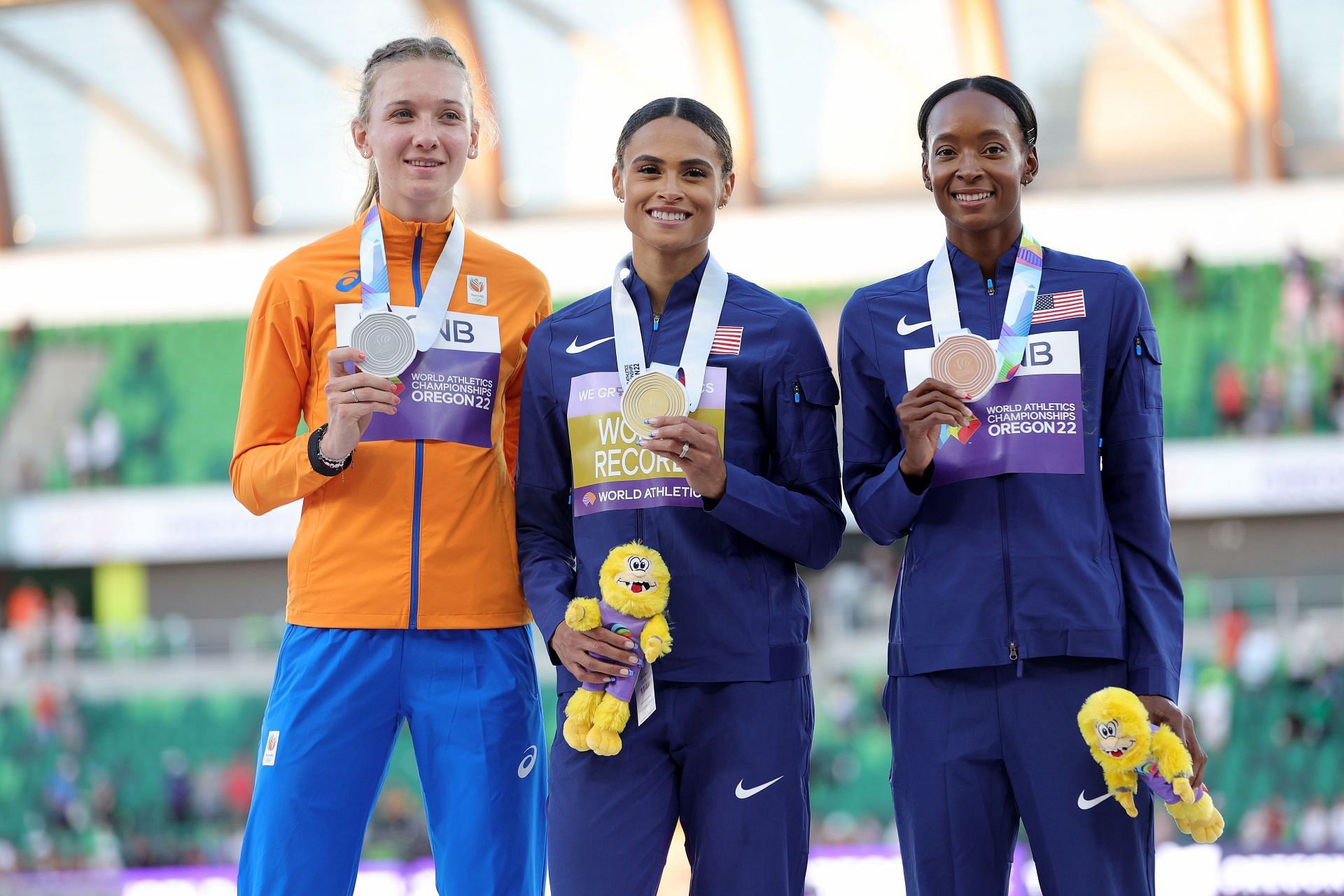 Femke Bol (L), Sydney McLaughlin (C) and Dalilah Muhammad (R) during the medal ceremony for the Women&#039;s 400m Hurdles Final at the World Athletics Championships Oregon22. (Photo by Carmen Mandato/Getty Images)