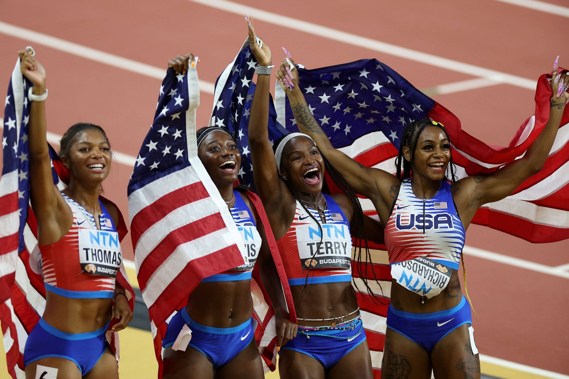 Gabby Thomas, Tamari Davis, Twanisha Terry, and Sha&#039;Carri Richardson of Team United States celebrate after winning the Women&#039;s 4x100m Relay Final during the 2023 World Athletics Championship at the National Athletics Centre in Budapest, Hungary.