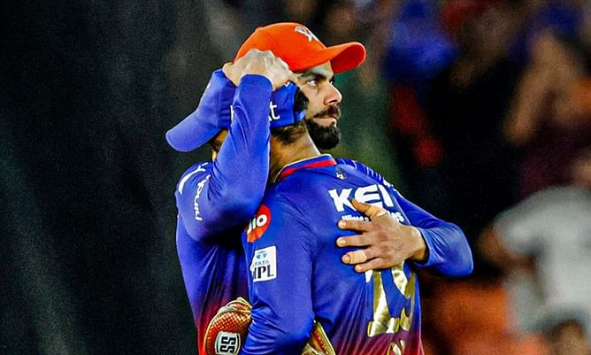 [In Pictures] Virat Kohli hugs and consoles Dinesh Karthik after RCB's heartbreaking loss vs RR in Eliminator of IPL 2024