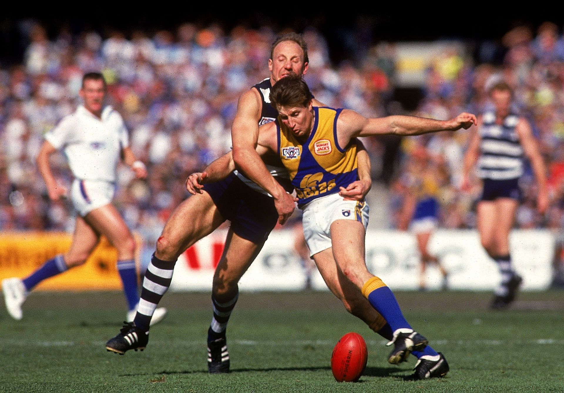 Gary Ablett Sr tackles John Worsfold of the Eagles