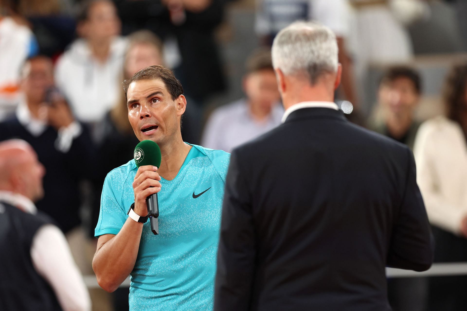 Rafael Nadal speaks to the crowd at 2024 French Open.