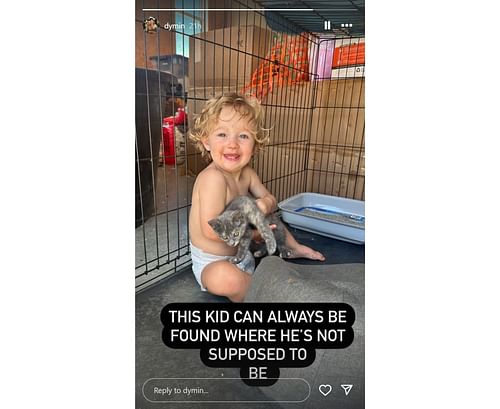 Judge Ryder Lynn adorably poses while holding a cat (Photo from Dymin Lynn's Instagram story)