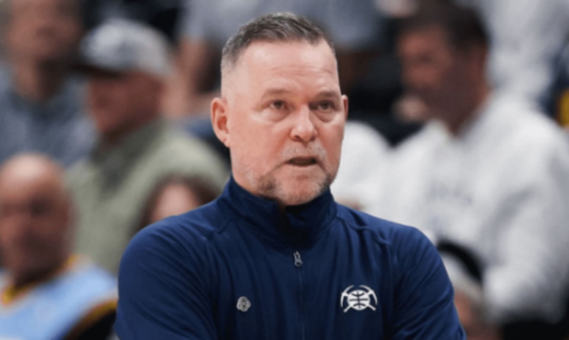 Michael Malone gets into altercation with Timberwolves fan