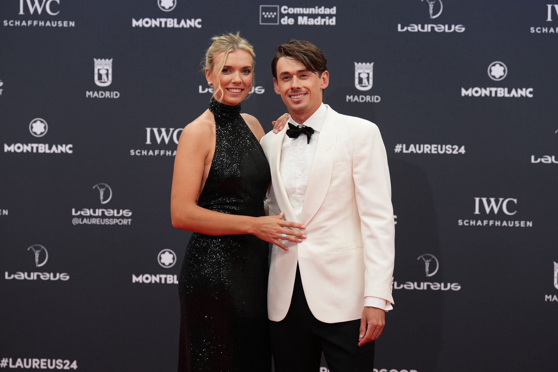 Katie Boulter (L) and Alex de Minaur (R) strike a pose on the red carpet while attending the Laureus World Sports Awards Madrid 2024