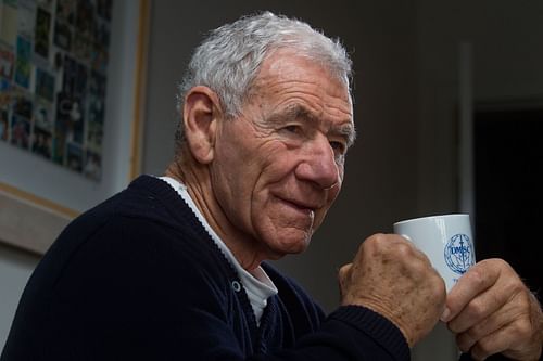 Former VFL football player and coach Tom Hafey poses for photos after his early morning training session