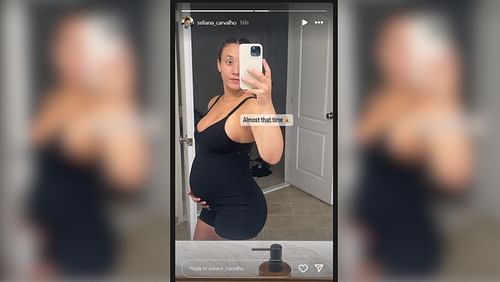 Mike Sainristil's girlfriend Seliana Carvalho posing with her baby bump