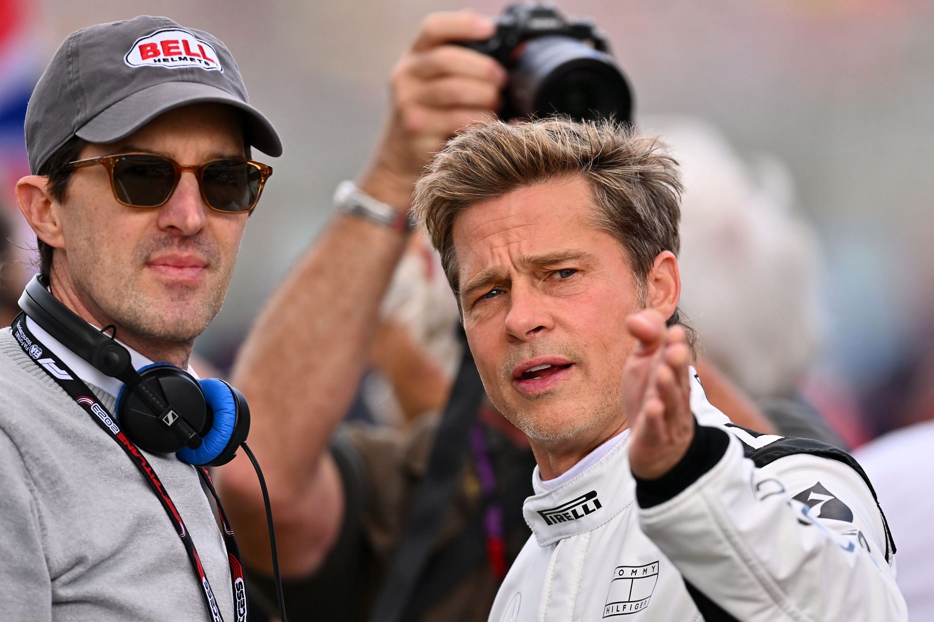 Brad Pitt in conversation with director Joseph Kosinski during the 2023 F1 British GP (Photo by Dan Mullan/Getty Images)