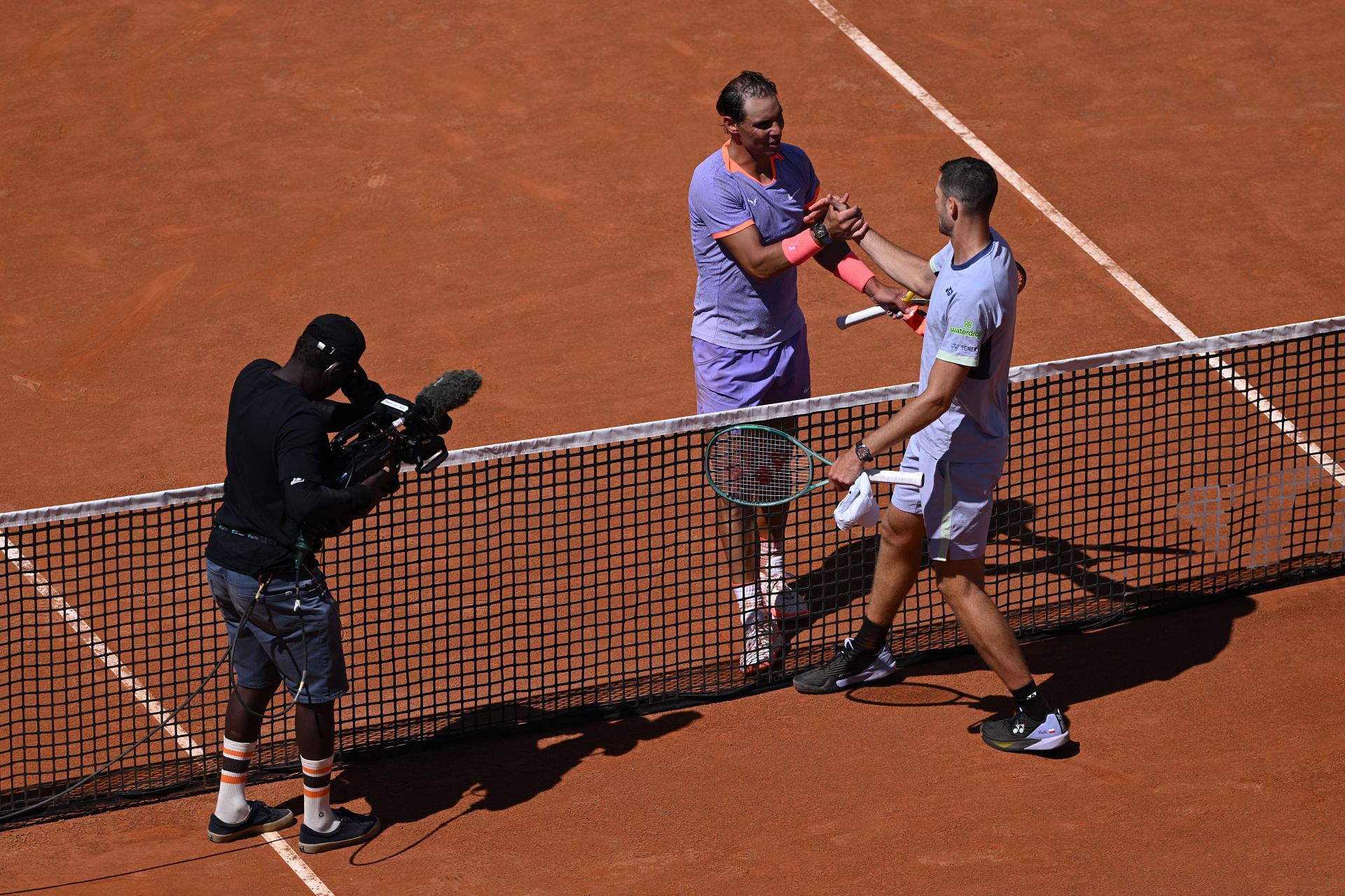 Rafael Nadal and Hubert Hurkacz shaking hands after their second-round match at the 2024 Italian Open