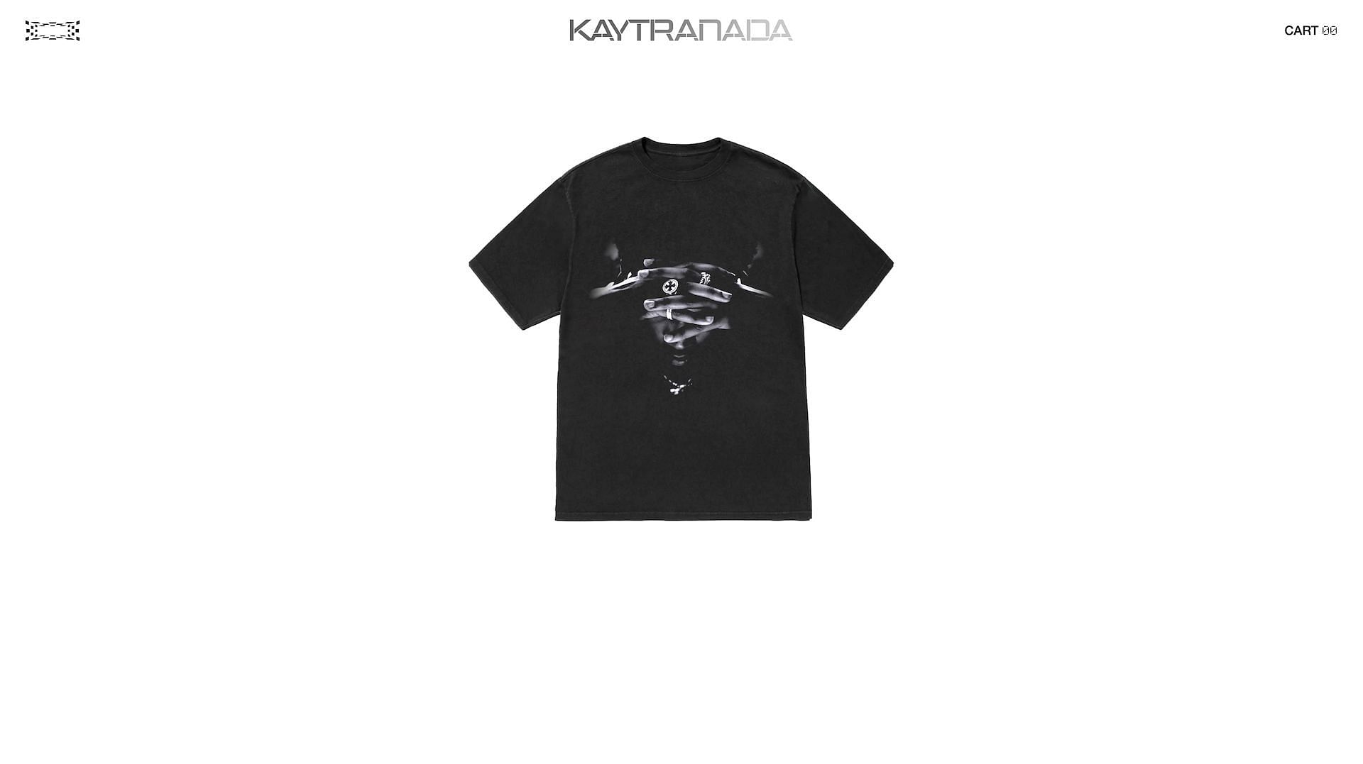 A screenshot of the &quot;Black Tee - Merch&quot; that Kaytranada has listed on his website for &#039;Timeless&#039; (Image via www.kaytranadamerch.com)