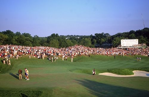 Tiger Woods hugging Bob May after his victory at Valhalla (Image via Getty)