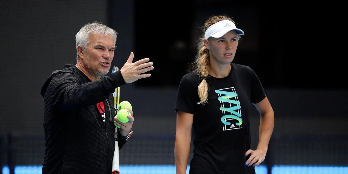 Caroline Wozniacki [R] and her father Piotr [L] during a practice session (Source: Getty)