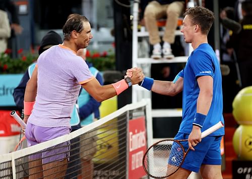 Jiri Lehecka greets Rafael Nadal at the net after their Madrid Open clash