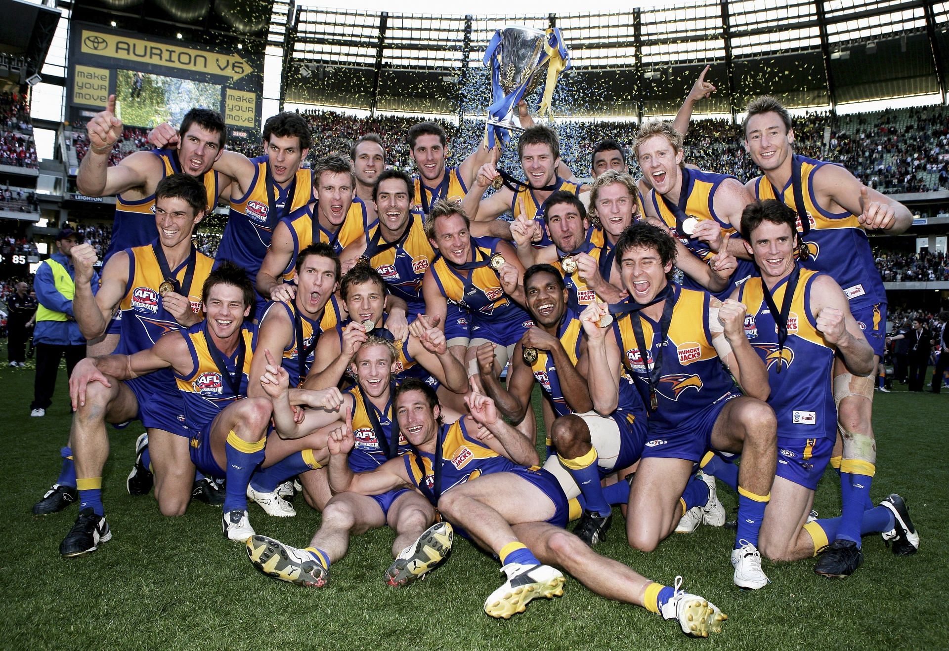 West Coast Eagles players celebrate after winning the AFL Grand Final match between the Sydney Swans and the West Coast Eagles