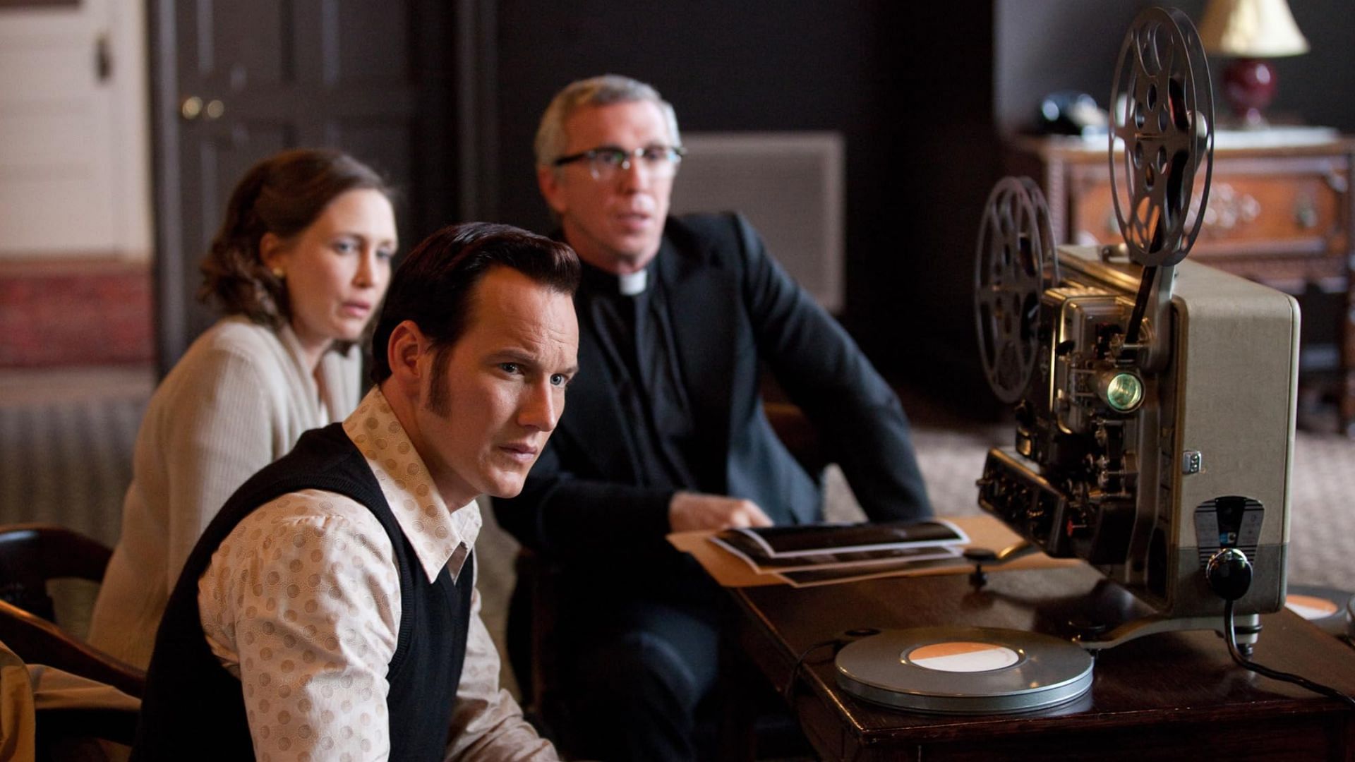 Vera Farmiga, and Patrick Wilson in The Conjuring (Image via Warner Bros. Entertainment Inc.)