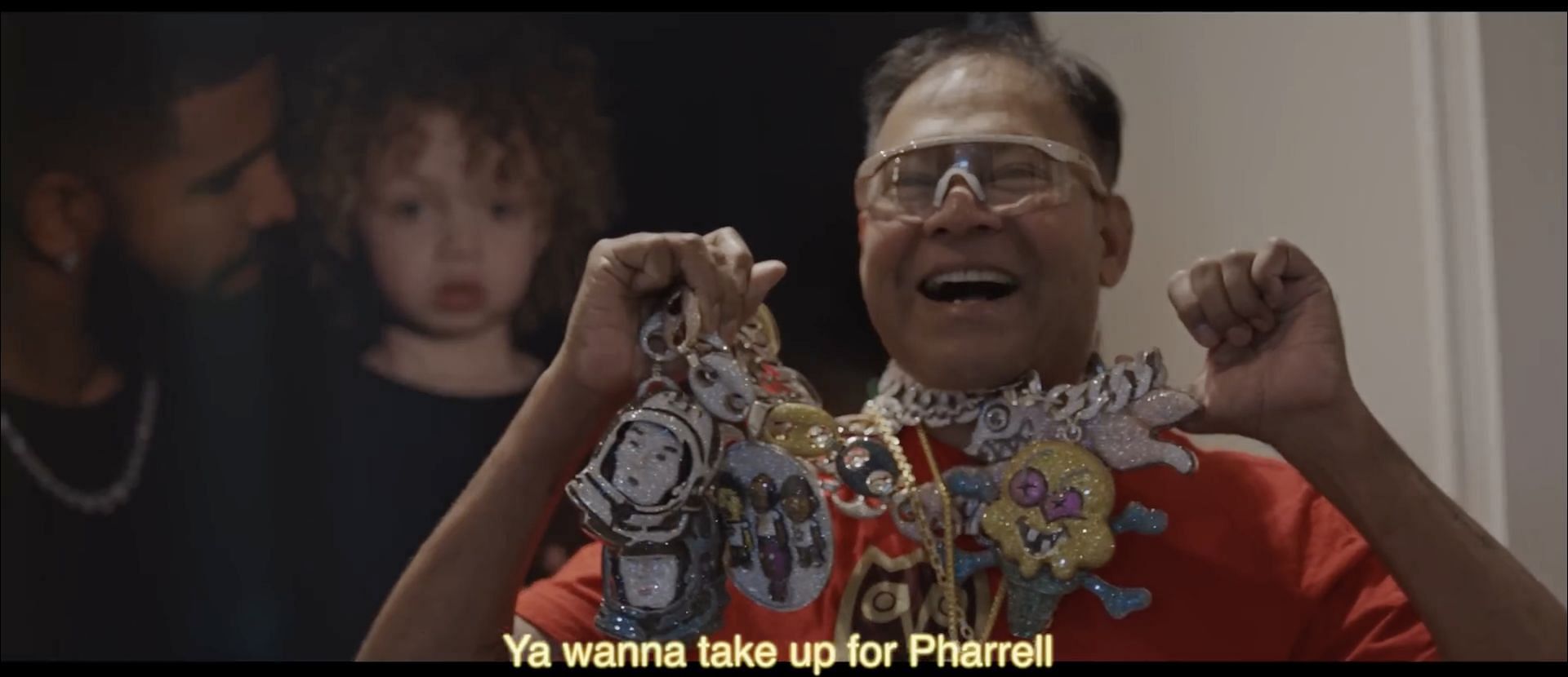 Pharrell Williams&#039; jewelry collection as seen in the music video for &#039;Family Matters&#039; (Image via YouTube/@DrakeOfficial)