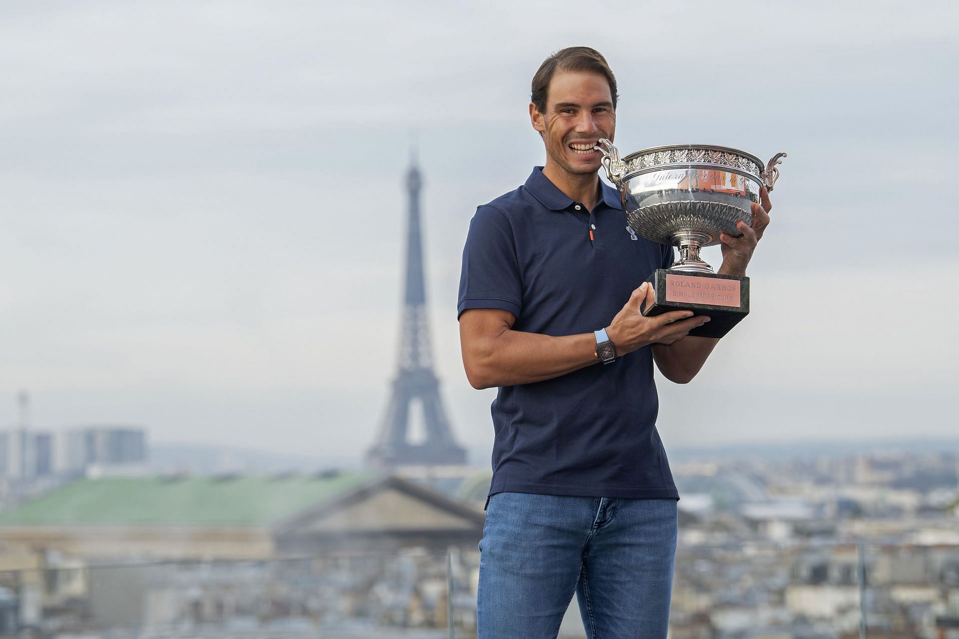 Rafael Nadal poses with his French Open trophy in 2020