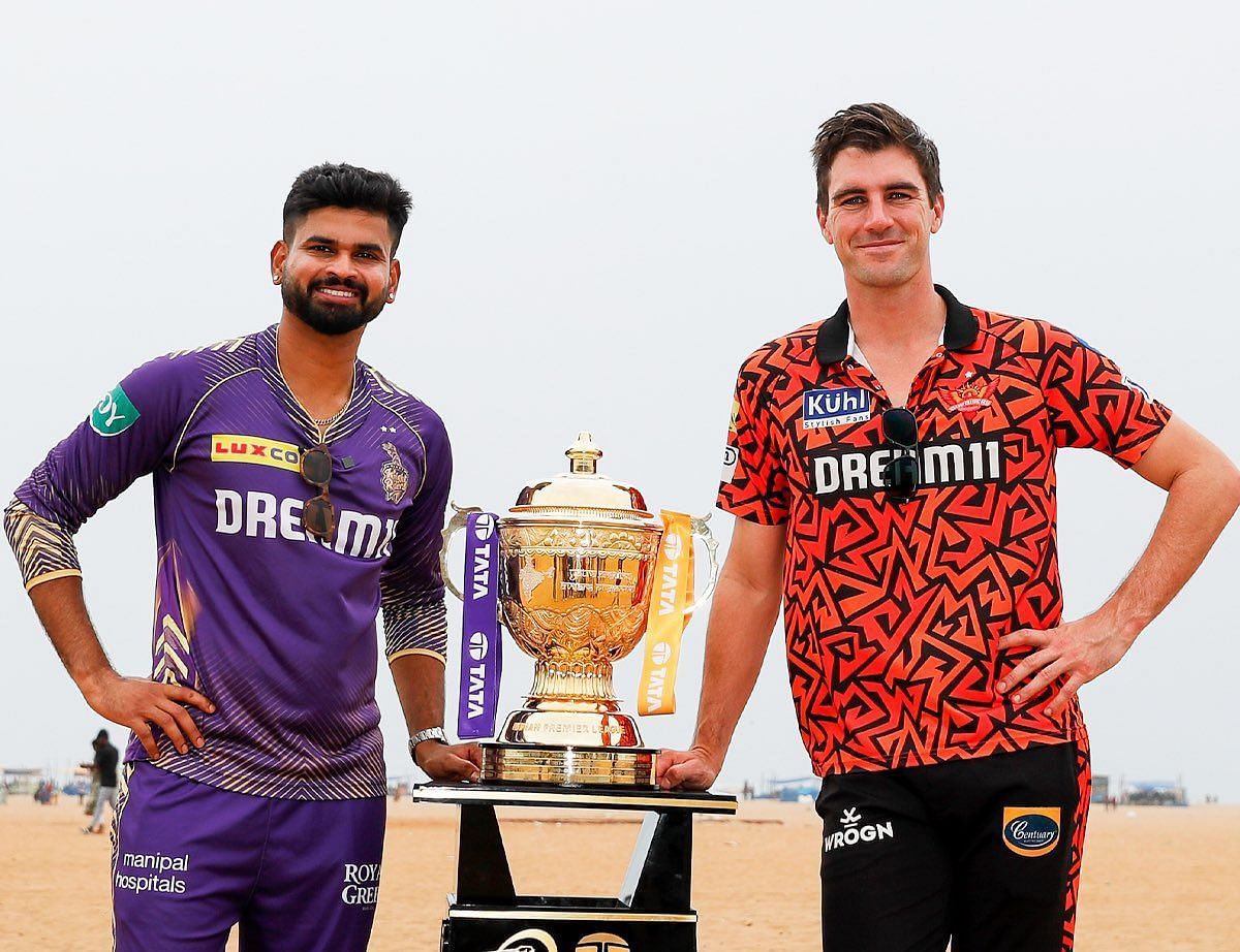 Shreyas Iyer and Pat Cummins with the trophy.