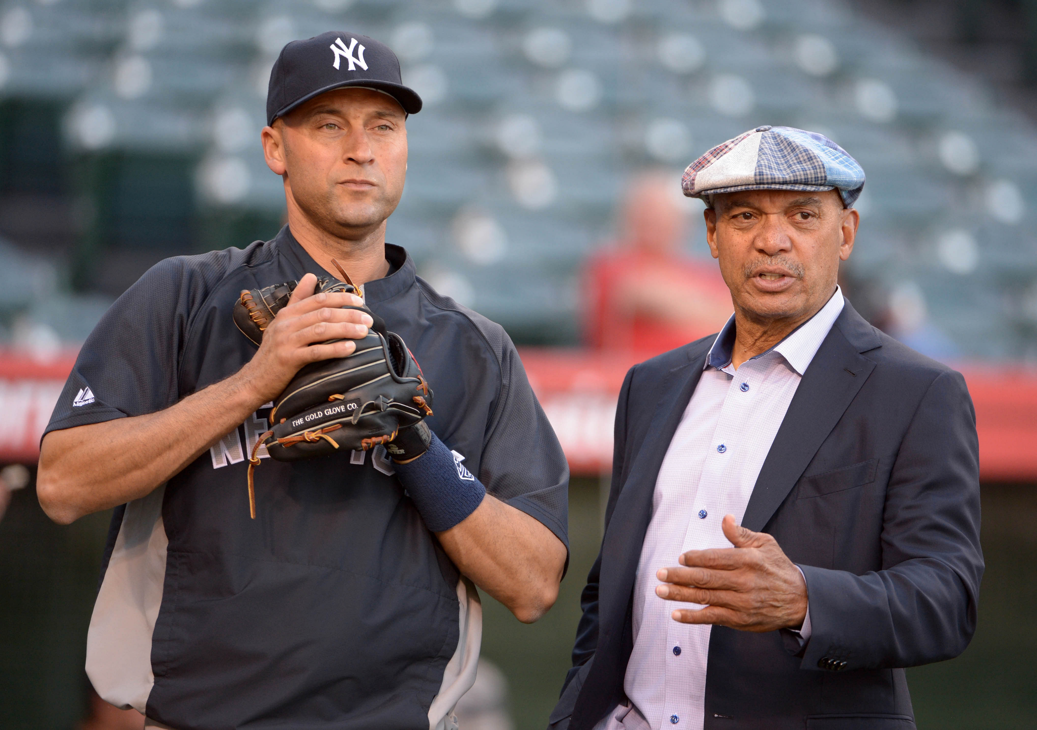 New York Yankees - Derek Jeter and Reggie Jackson 9Image via USA Today)