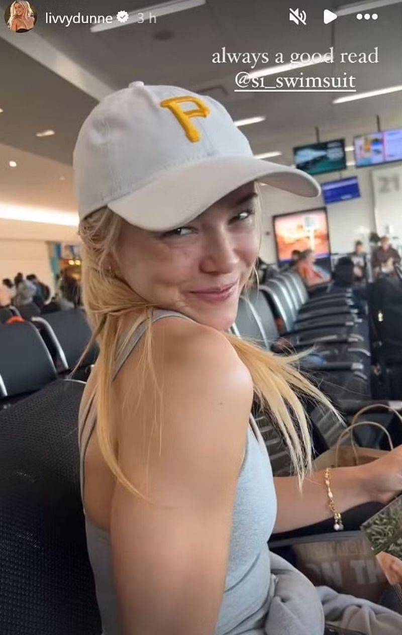 Olivia Dunne reading the SI Swimsuit magazine at the airport. PHOTO: OLIVIA DUNNE/INSTAGRAM