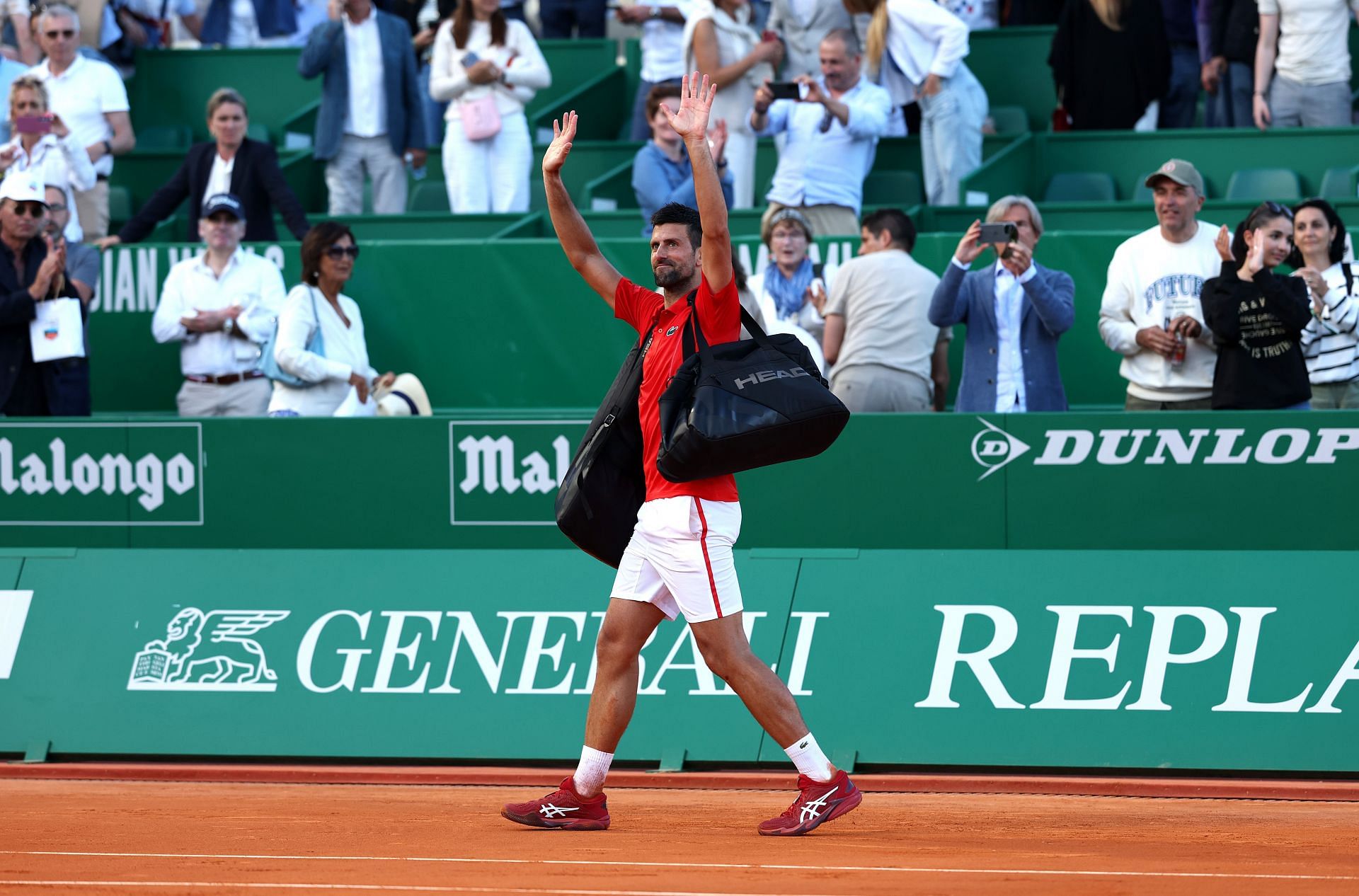 Novak Djokovic waves goodbye to the crowd after his semi-final loss at the Monte Carlo Masters